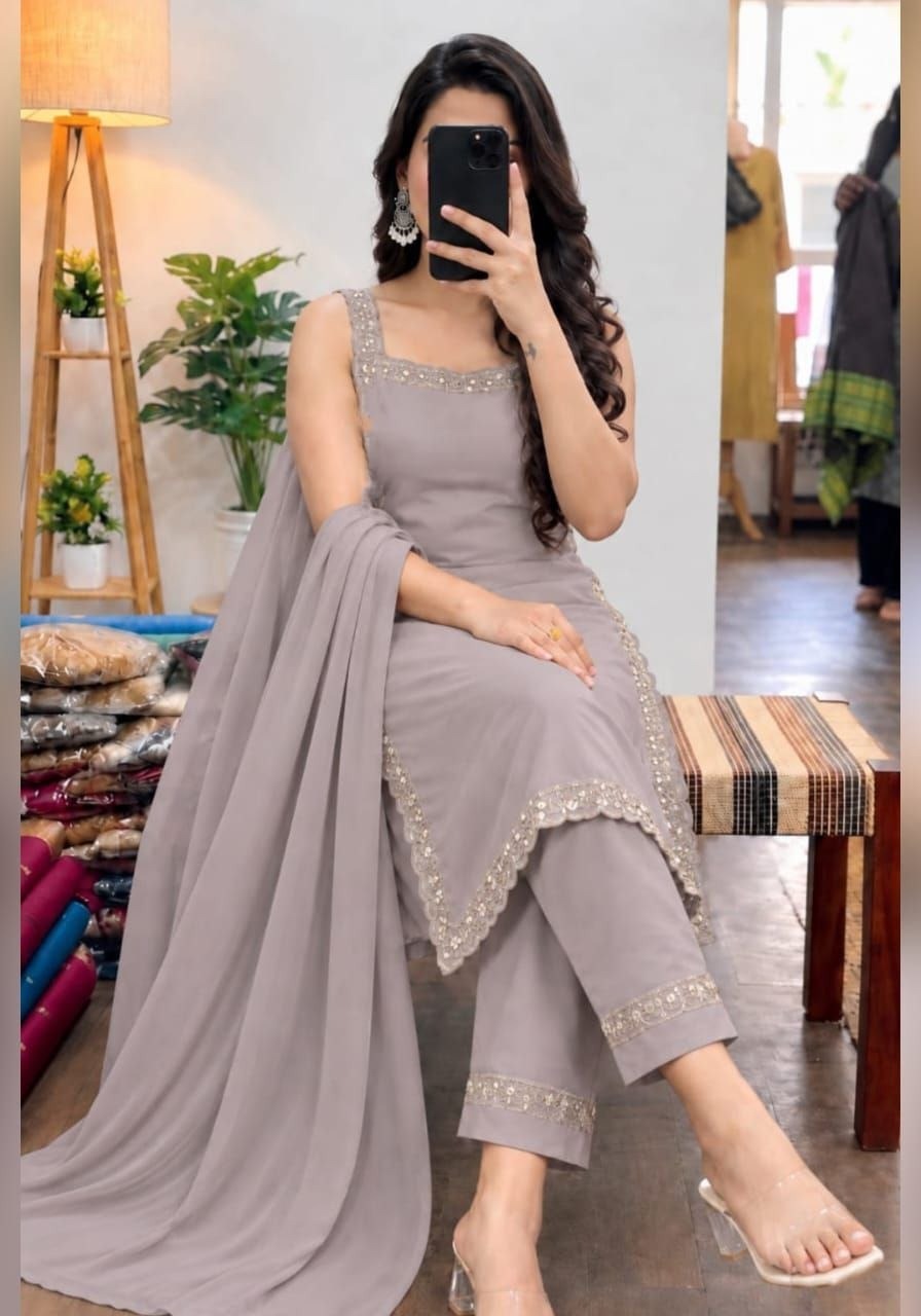 Grey lavender embroidered sleeveless salwar suit