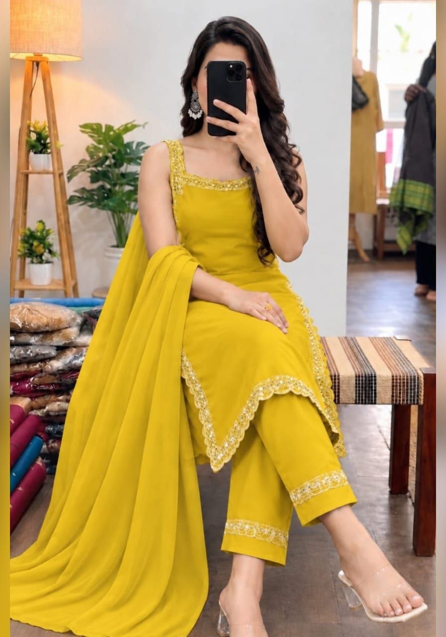 Mustard yellow embroidered sleeveless salwar suit